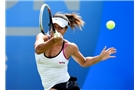 BIRMINGHAM, ENGLAND - JUNE 10:  Heather Watson of Great Britain in action during her first round match against Aleksandra Wozniak of Canada on day two of the Aegon Classic at Edgbaston Priory Club on June 10, 2014 in Birmingham, England.  (Photo by Tom Dulat/Getty Images)